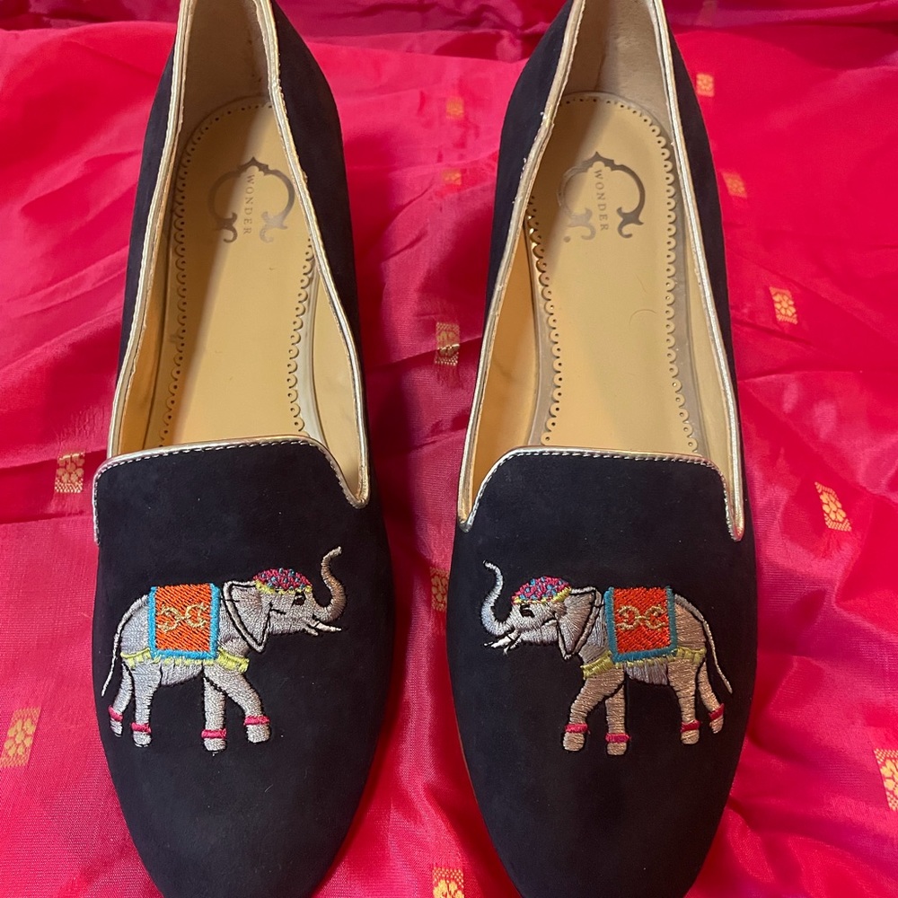 C Wonder flats with embroidered elephant.